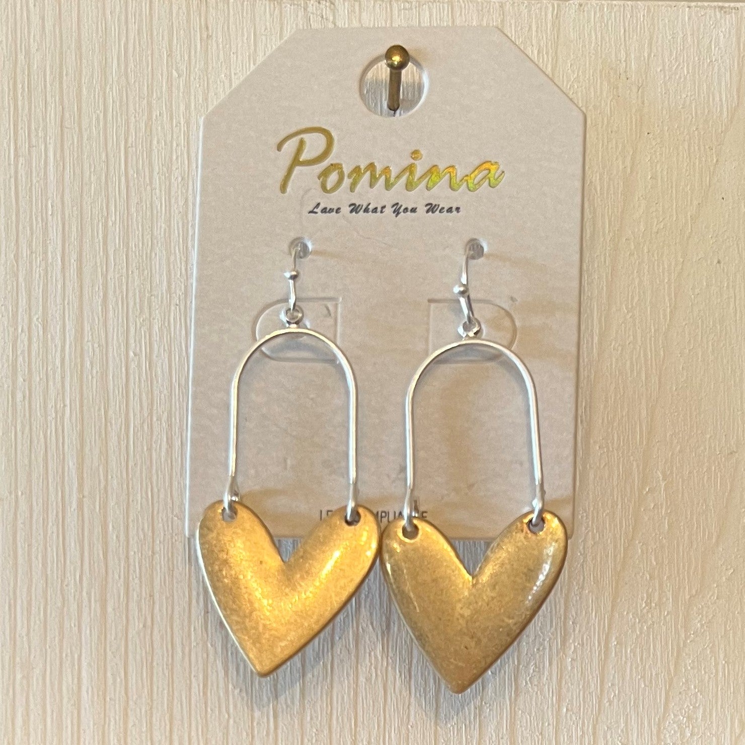 These matt earrings are just right for the Valentine season or anytime you want to show love! They are a unique combination of gold and silver. The heart is one color and the wire hardware is the other. The heart is more prominent so you can choose which color you want more of!