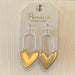 These matt earrings are just right for the Valentine season or anytime you want to show love! They are a unique combination of gold and silver. The heart is one color and the wire hardware is the other. The heart is more prominent so you can choose which color you want more of!