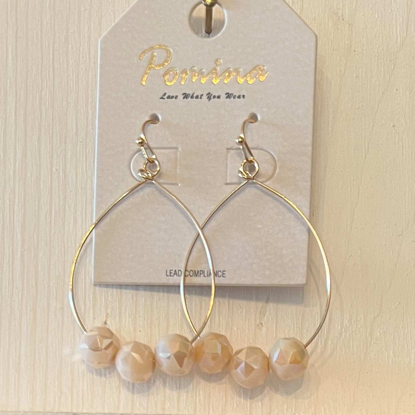 Teardrop-shaped Gold Earrings with Crystal Beads