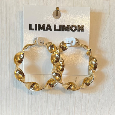 These gold earrings have a unique look with their twisted design! The finish is shiny and the hoop is approximately 1.5". These earrings are on the dressy side and will add sparkle to your look!