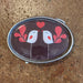 Princess & Butch - Belt Buckles: Red and white love birds on brown background