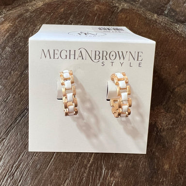 Our Gold & White Ornate Hoop Earrings feature gold and white settings with an ornate hoop design, perfect for any occasion. These post earrings add the perfect touch of elegance to any look.