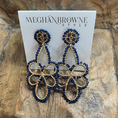 These Navy & Gold Ornate Earrings feature a floral/geometric design and are crafted with a sturdy post backing. The colors perfectly complement each other, with a striking navy and an luminous gold. These earrings will take your look to the next level.