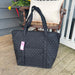 This lightweight black Quilted Tote is the epitome of style and convenience. With its quilted texture and roomy interior, it is sure to be the ideal accessory for daily use.  Material: Quilted cotton canvas  Dimensions: 21w x 14.75h x 7.75d  Care Instructions: Spot clean  Additional cost for monogramming.