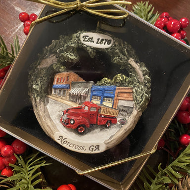 Historic Norcross Christmas ornament depicts the main street with a vintage red pickup truck