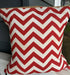 Red & White Chevron print on the front and burlap on the pack. Pillow is stuffed with feathers.