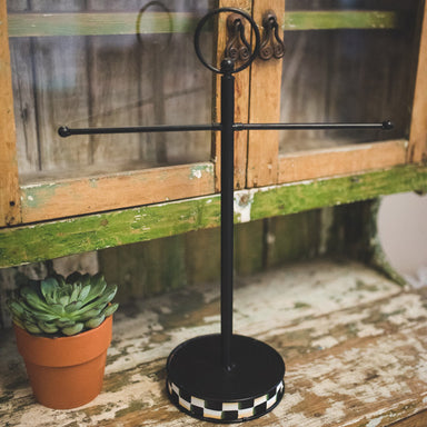 Hand Towel Holder with Finial and black and white checked base