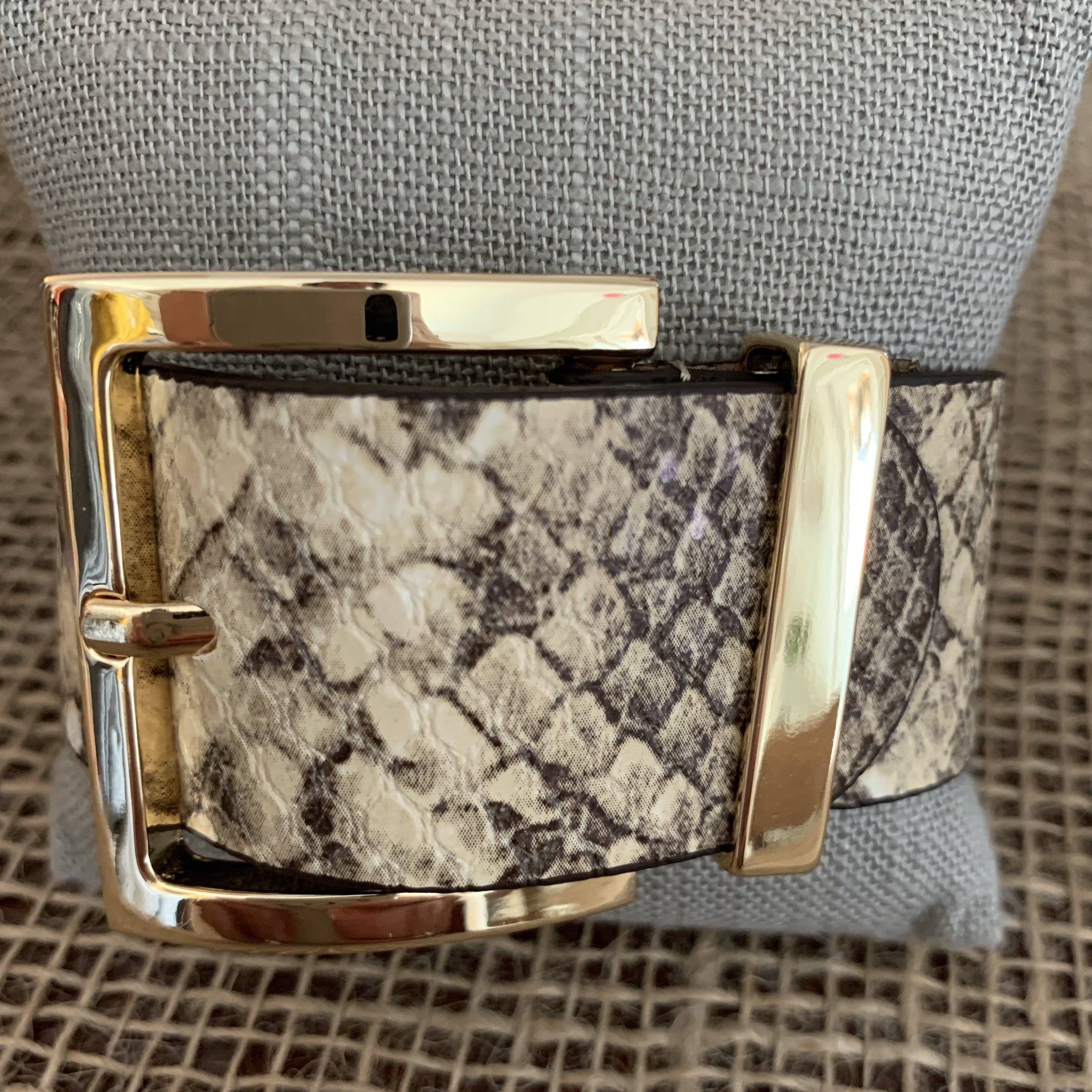 Snake print grey leather belt bracelet with gold buckle fastener