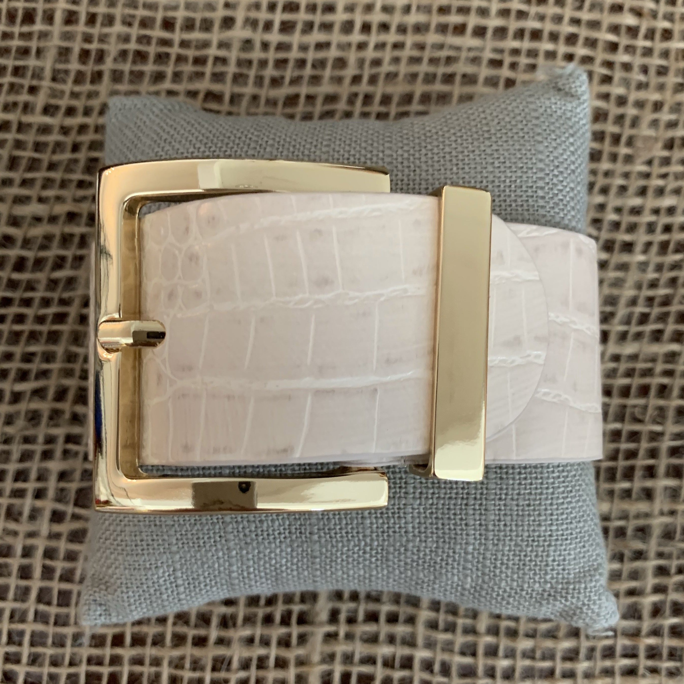 Alligator print cream leather belt bracelet with gold buckle fastener