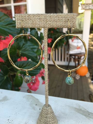 Locally made, these gorgeous pressed hoop earrings which accent beads are the perfect statement piece. 