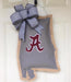 This state of Alabama doorhanger with Alabama A is made right here in Peachtree Corners by local textile artist, Allison Wright and provides an oh, so easy way to show support of the Crimson Tide!
