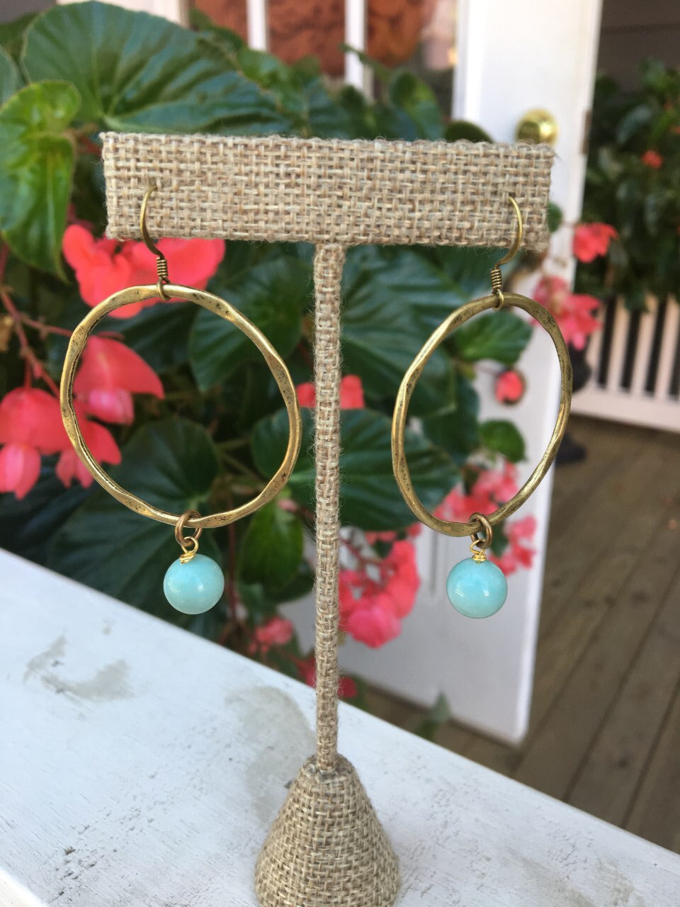 Locally made, these gorgeous pressed hoop earrings which accent beads are the perfect statement piece. 