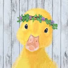 Grey rustic plank background with yellow duckling wearing a green and purple floral crown.