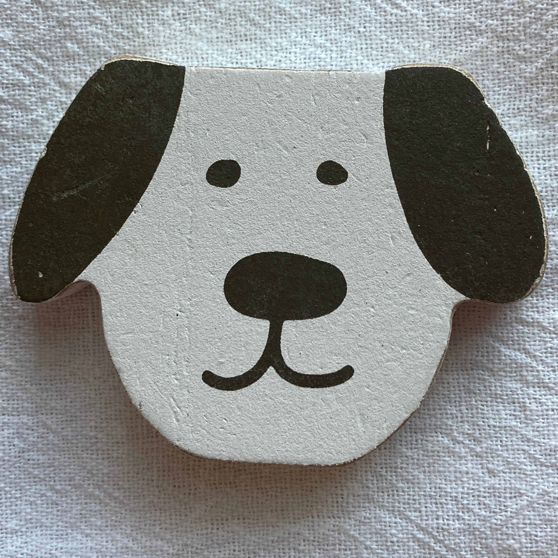 Black and white puppy tile