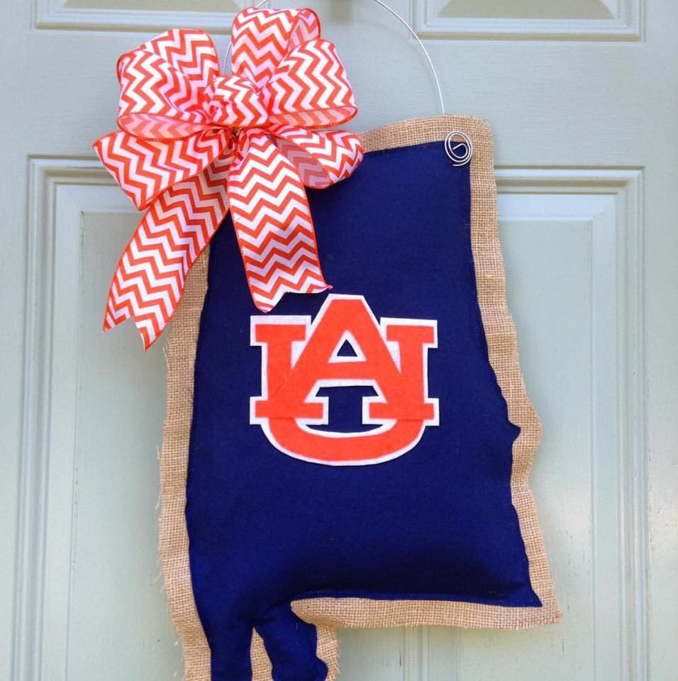 State of Alabama, Auburn themed door hanger. Navy blue with orange auburn logo and orange and white bow.